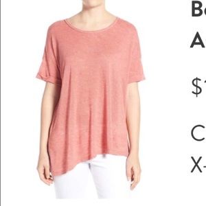 Short sleeve asymmetrical knit top